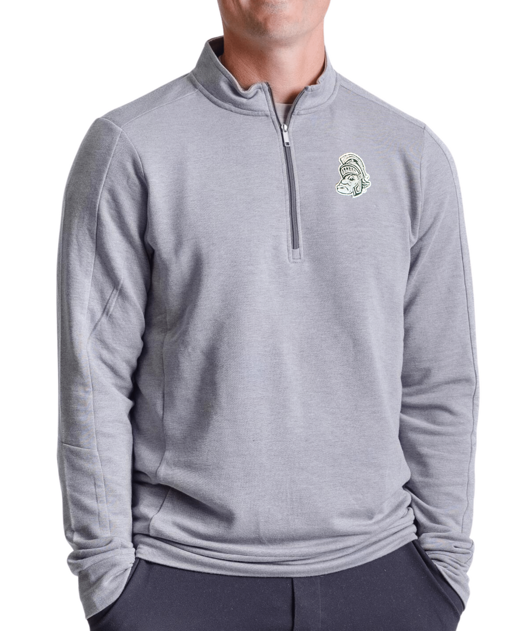 Male wearing a grey Michigan State Quarter Zip with a white Gruff Sparty embroidery.