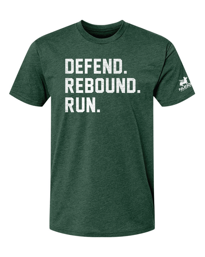 Green tee shirt with the text "Defend. Rebound. Run." printed across the chest in white. Printed in Michigan by Nudge Printing.