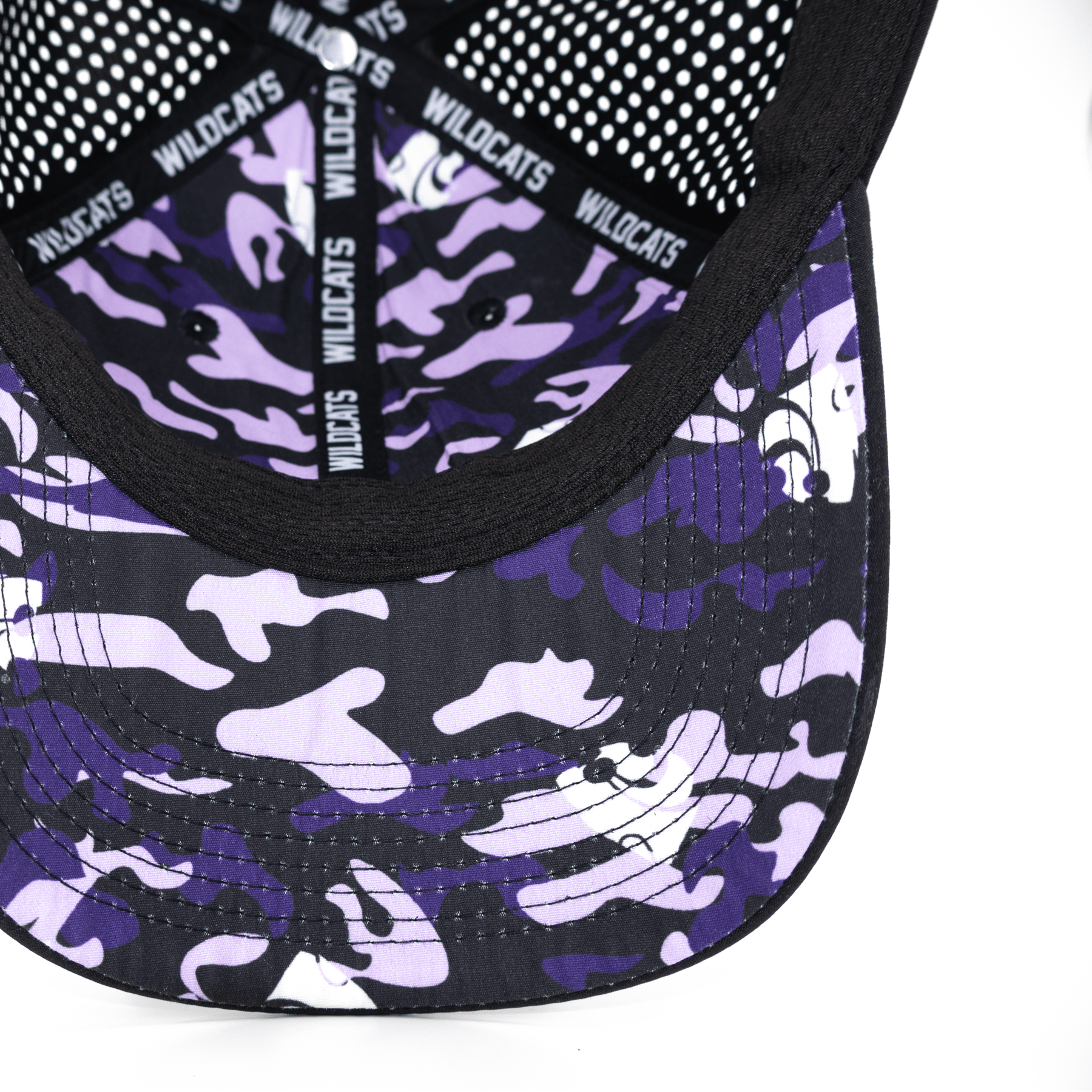 Close up view of black Kansas State hat with custom purple and black KSU camo pattern on the inside bill and lining.