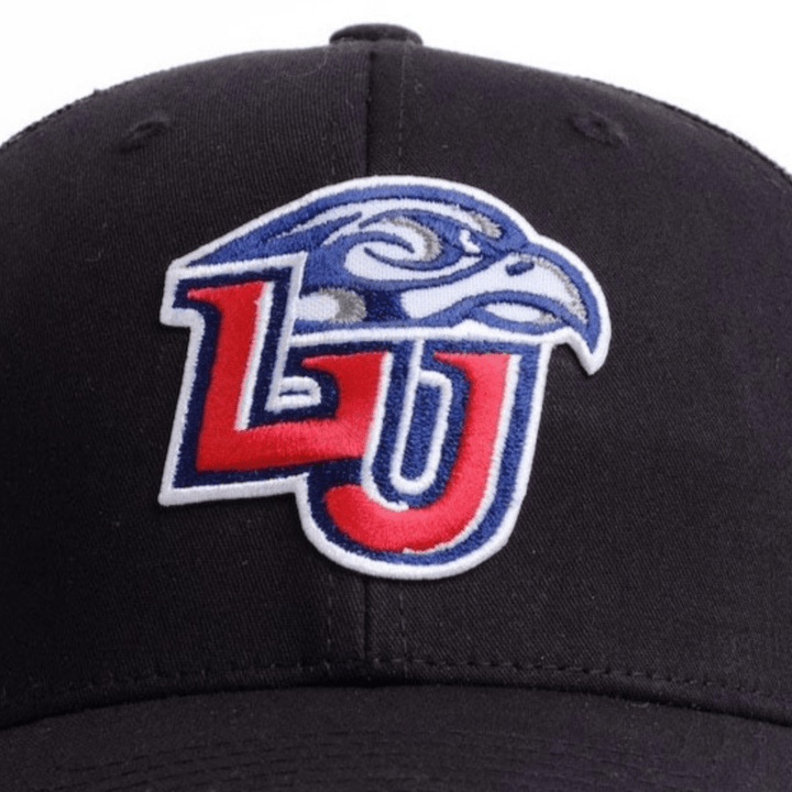 Close up picture of a Liberty University black hat with the LU logo on the front