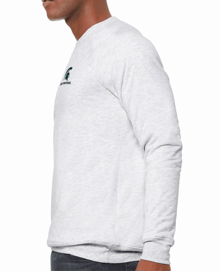 Side view of a man wearing a white Michigan State crewneck sweatshirt with a green Indy Spartans logo embroidered on the left chest