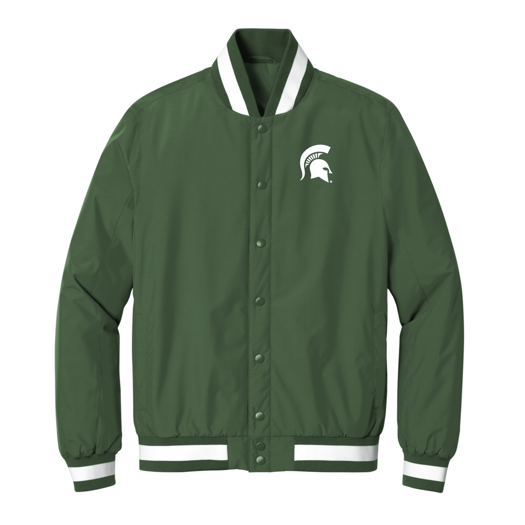 Front view of a Michigan State Varsity jacket with a white Spartan Helmet logo embroidered on the left chest .