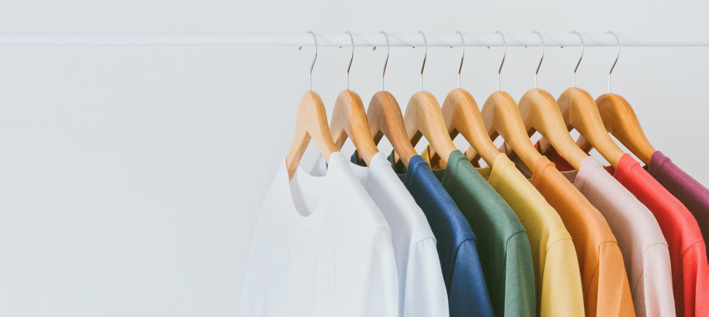 Nudge Printing Shirts Hanging on Hangers