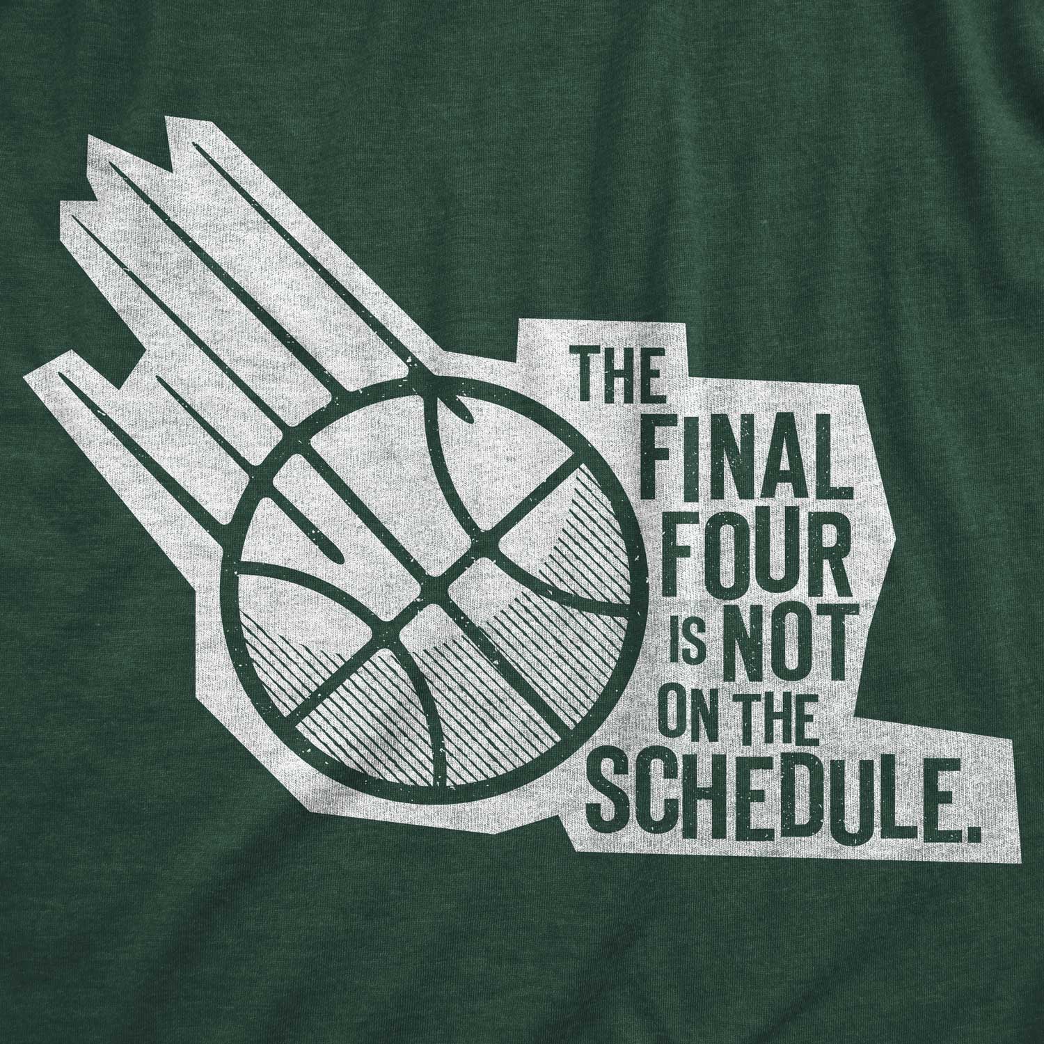 Green t-shirt with close up of the TFFINOTS - The Final Four is Not on the Schedule logo in white.