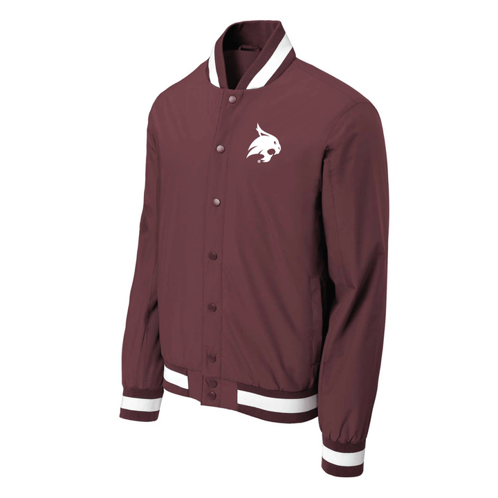 Angled view of a maroon Texas State varsity jacket with the bobcat logo embroidered in white thread on the left chest.