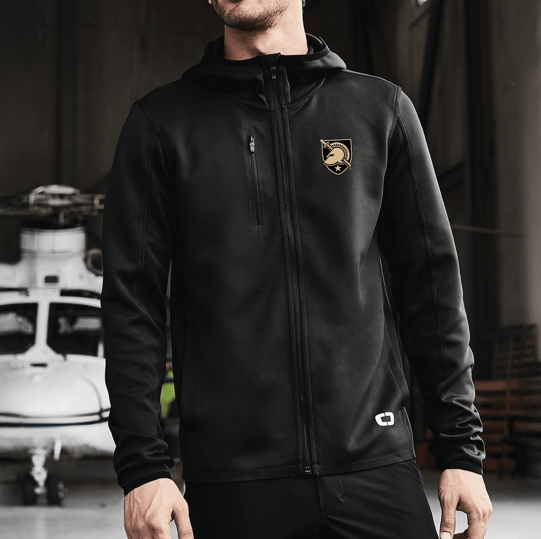 Male model wearing a black OGIO West Point performance jacket with the shield logo embroidered on the left chest.