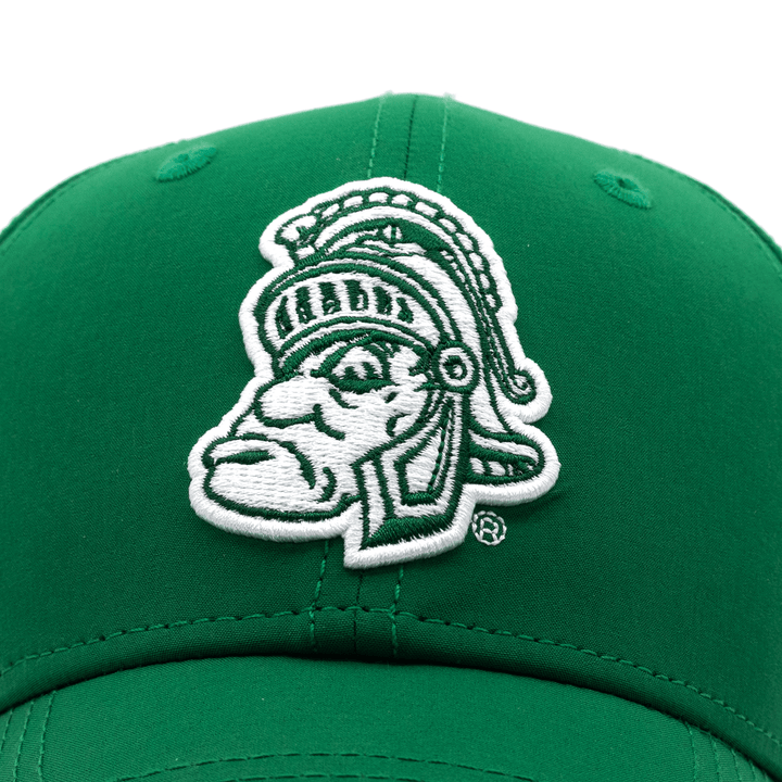 Close up view of green Michigan State hat with Gruff Sparty embroidered logo on the crown.