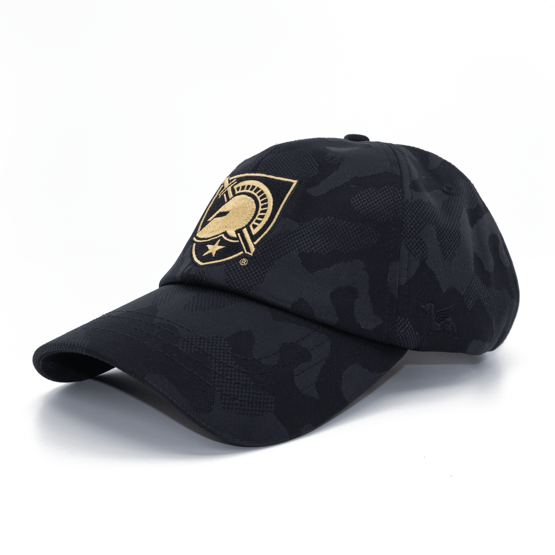 Angled view of a black camo West Point hat featuring the Black Knights shield logo embroidered on the front and a curved bill.