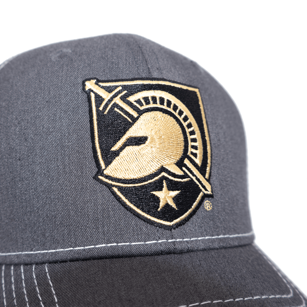 Close up view of West Point grey and white trucker hat with Black Knights shield logo embroidered on the front.