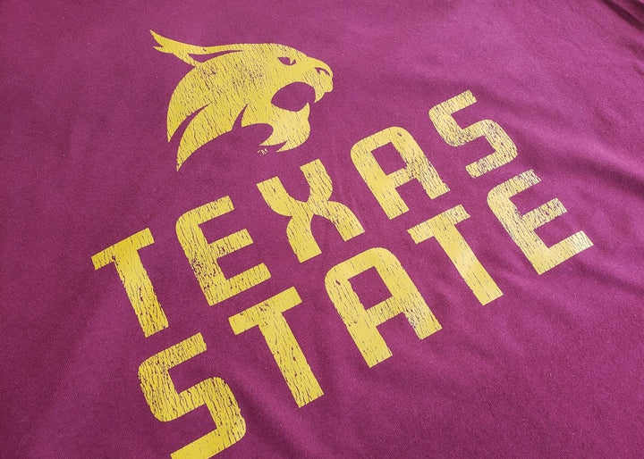 Texas State University Bobcats Stacked Logo T-shirt (Gold on Maroon)