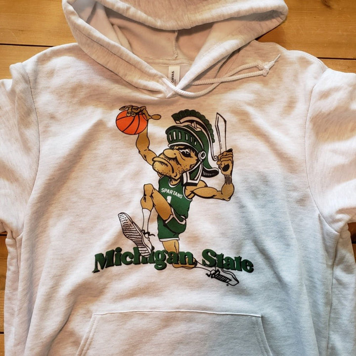 Lifestyle photo of MSU Dunking Gruff Hoodie