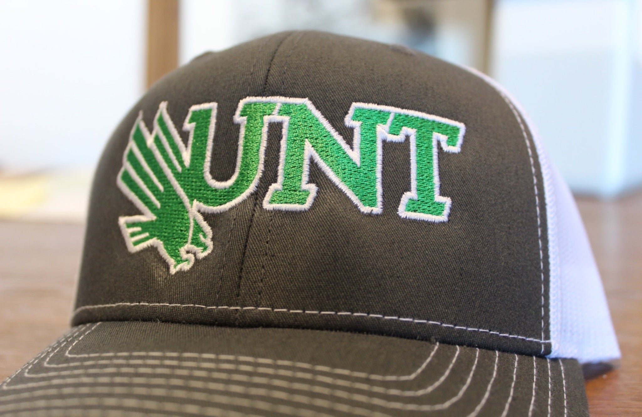 Show Your UNT Pride with the Stylish UNT Embroidered Fitted Trucker Hat!