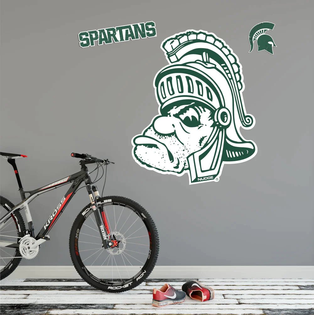 Gruff Sparty Michigan State Wall Decal hanging in a basement