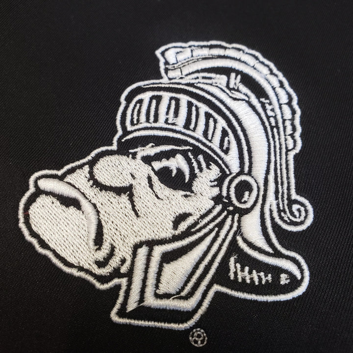 Close up of embroidered Michigan State gruff Sparty logo