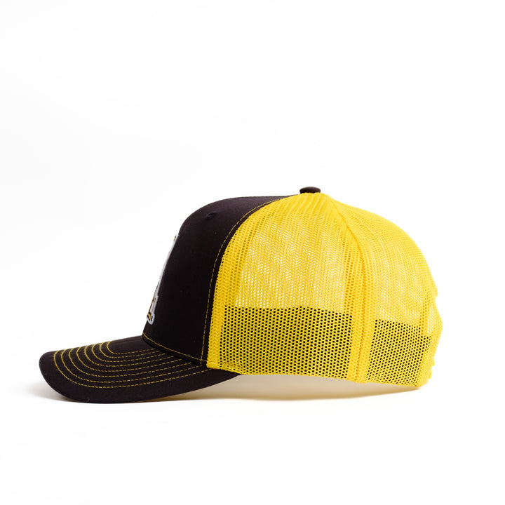 Left side view of black and yellow App State Trucker Hat with A Logo