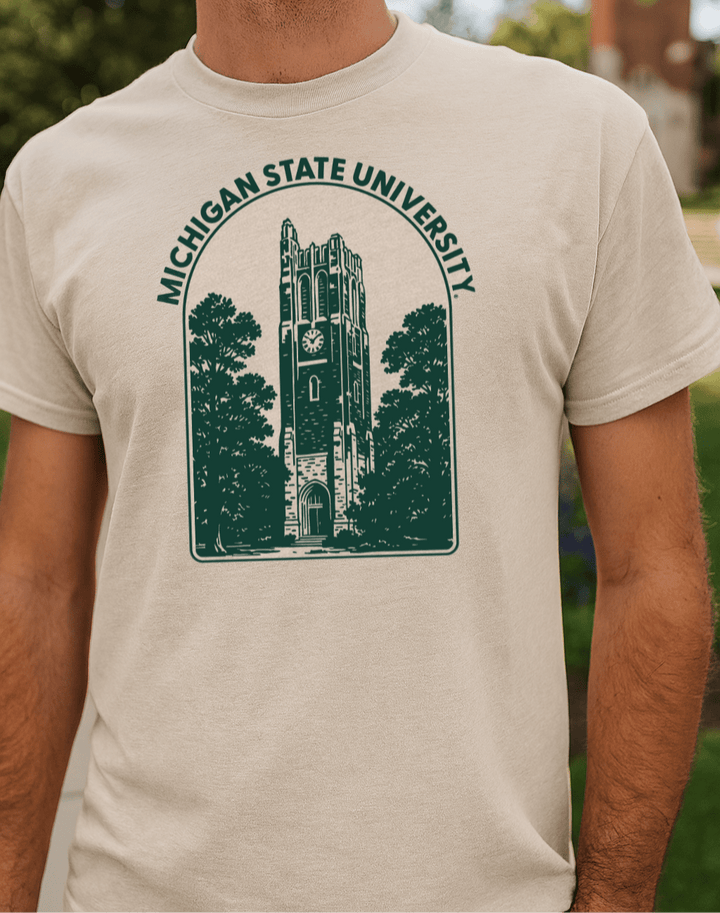 Michigan State short sleeve cream shirt on model with campus background