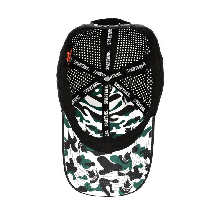 Inside view of a black Michigan State hat with green, black, and white camo pattern from Nudge Printing