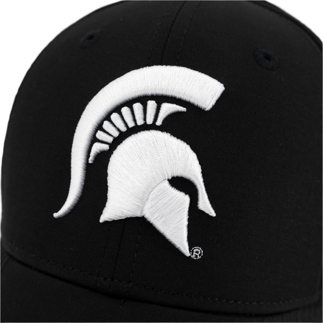 Close up view of a black Michigan State hat with a white raised Spartan Helmet embroidered on the front.