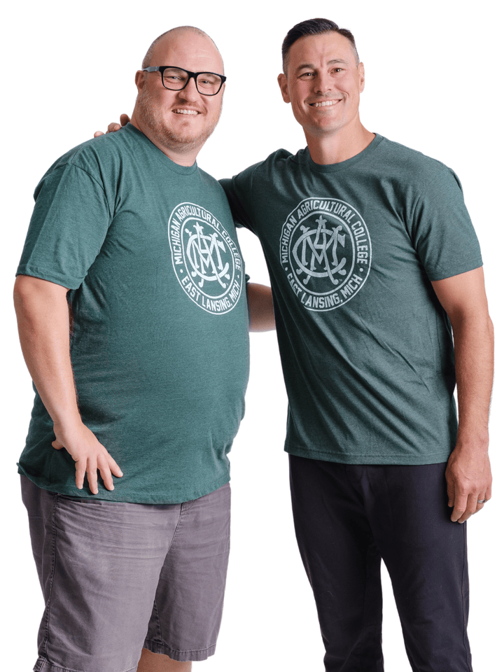Lifestyle photo of green Michigan State Vintage MAC T Shirt