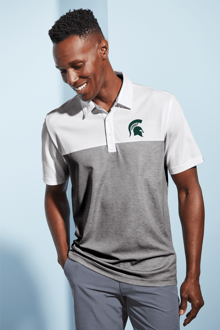 MSU TravisMathew Spartan Helmet Embroidered Grey and White Polo