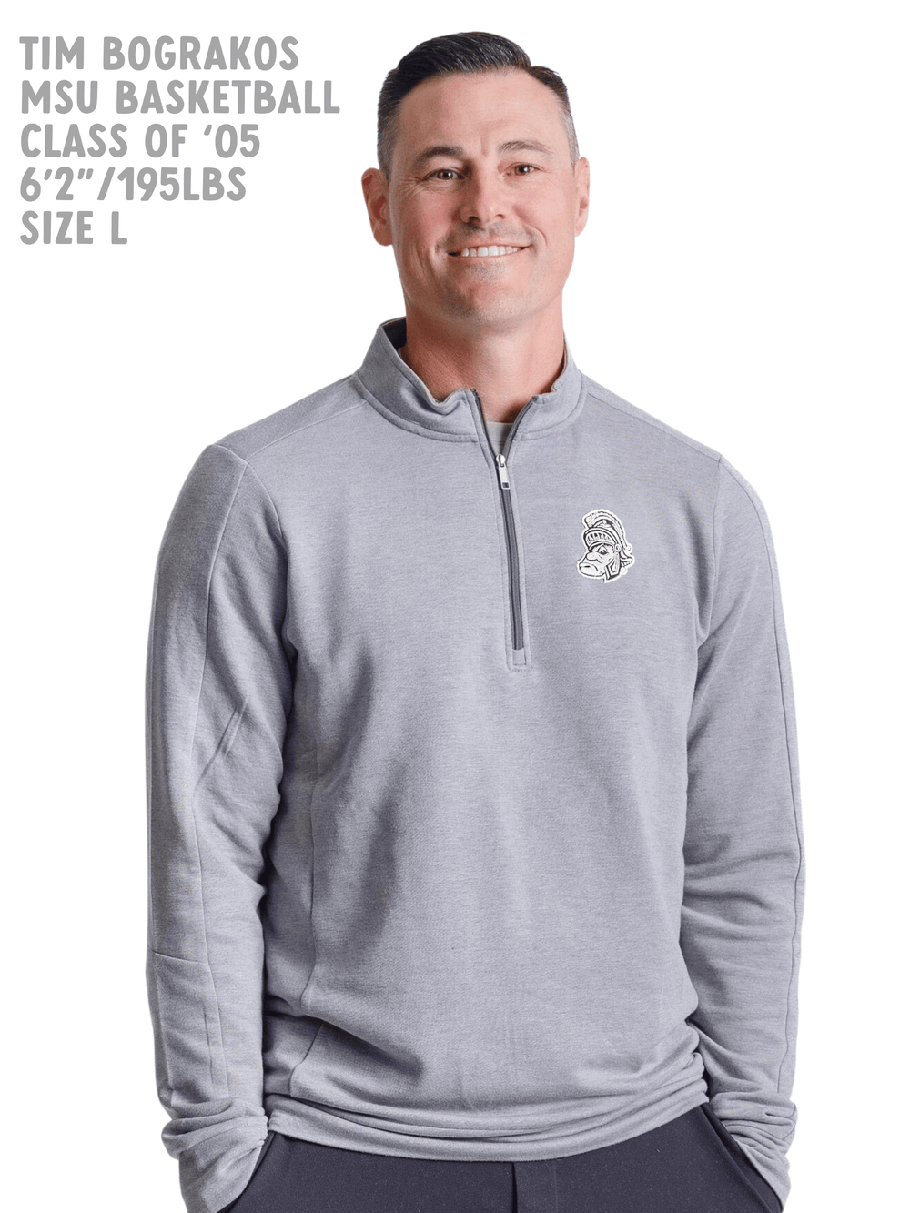 Michigan State Light Grey OGIO Quarter-zip with Gruff Sparty Logo on Tim Bograkos former MSU Basketball Player on white background