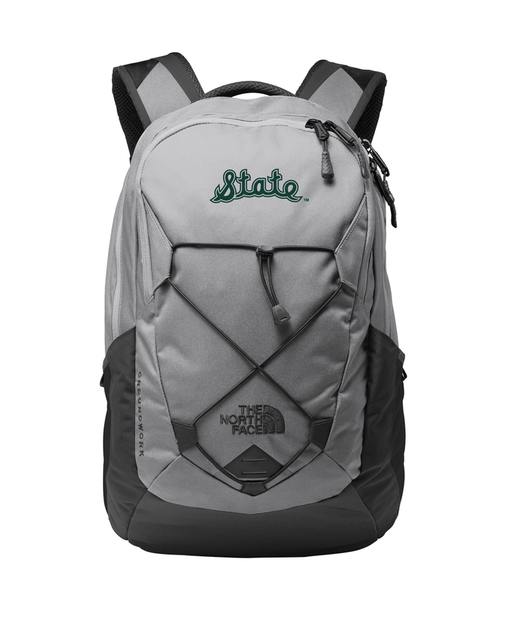 Grey Michigan State North Face backpack with green State Script embroidery on the front.