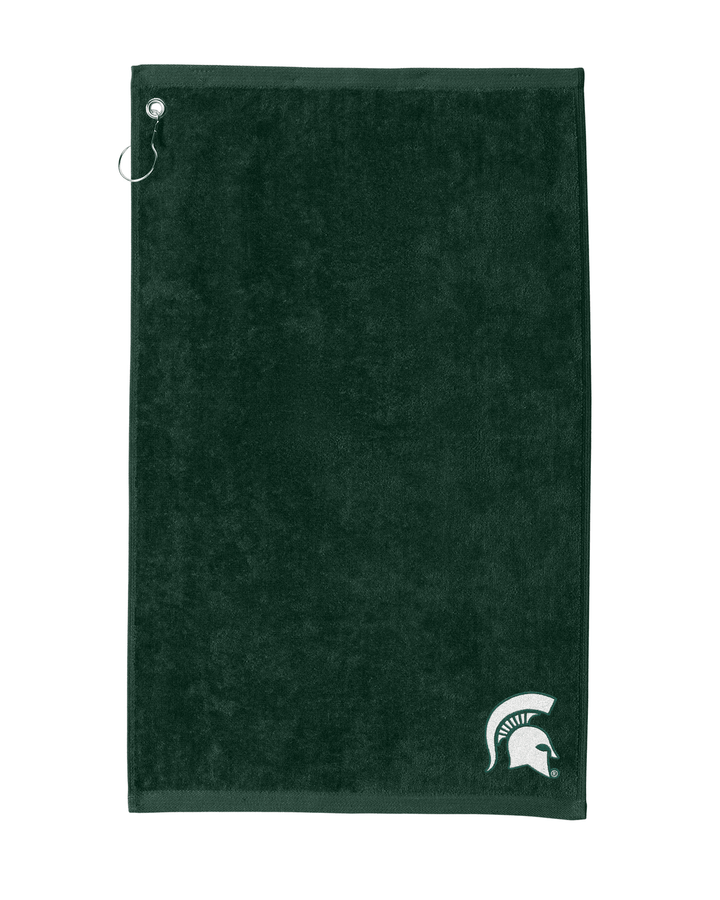 A dark green terry cloth golf towel featuring a white Michigan State Spartans helmet logo in the bottom right corner and a metal grommet on the left edge, shown against a plain white background.