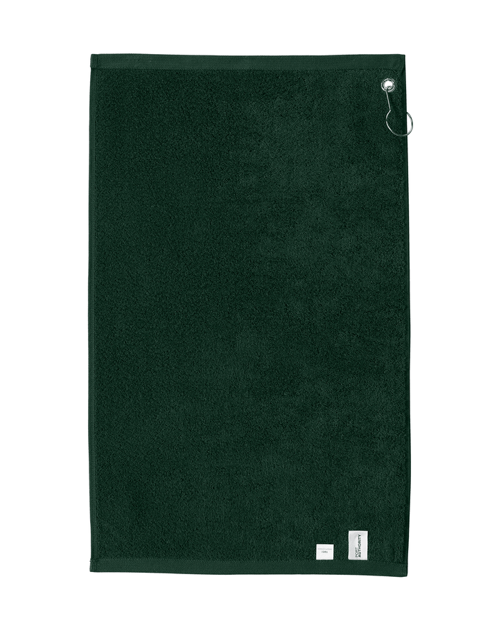 A dark green plush golf towel with a silver metal grommet on the left edge and a white embroidered Michigan State Spartans Gruff Sparty logo in the bottom right corner, shown against a plain white background.
