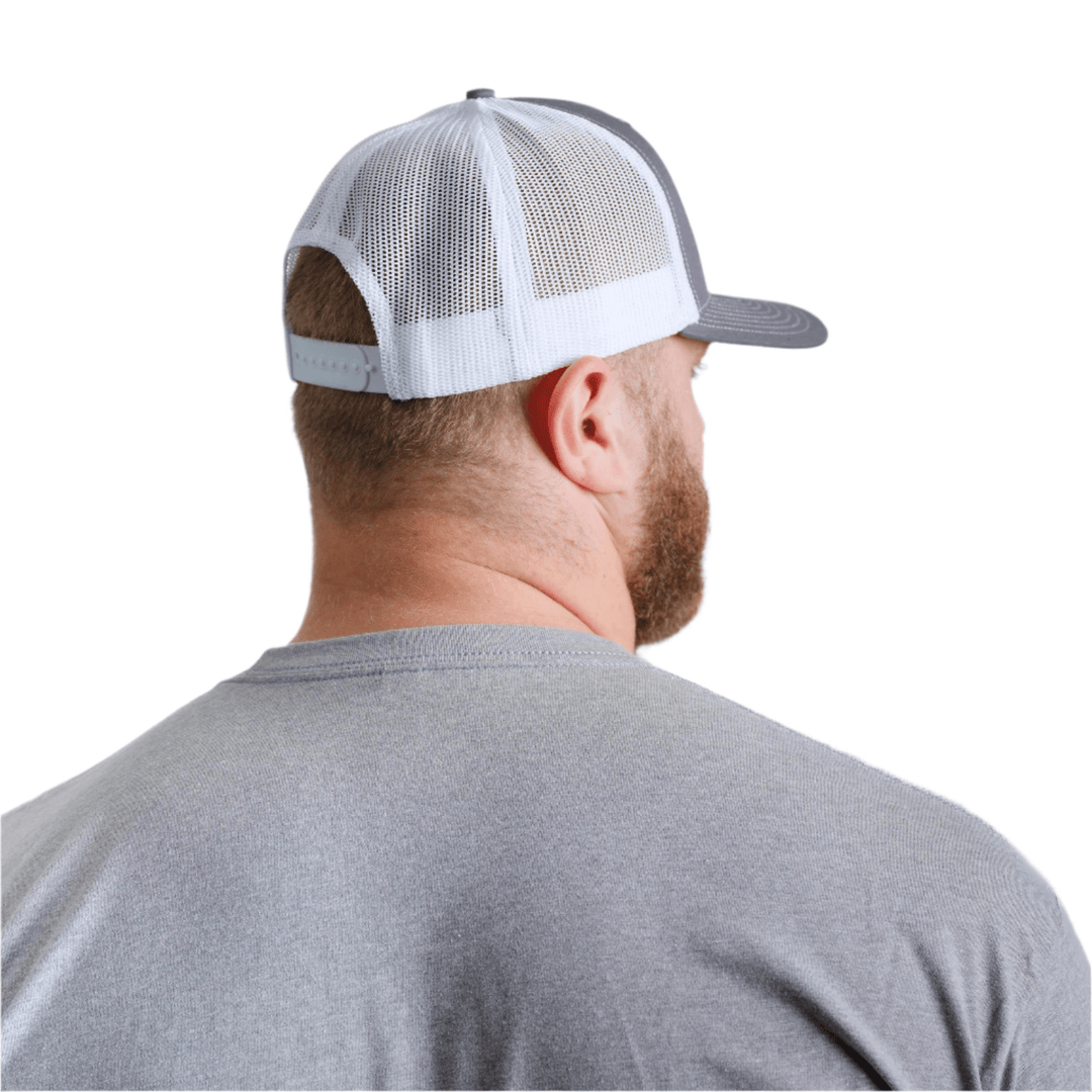 Back view of a grey and white trucker hat from Nudge Printing