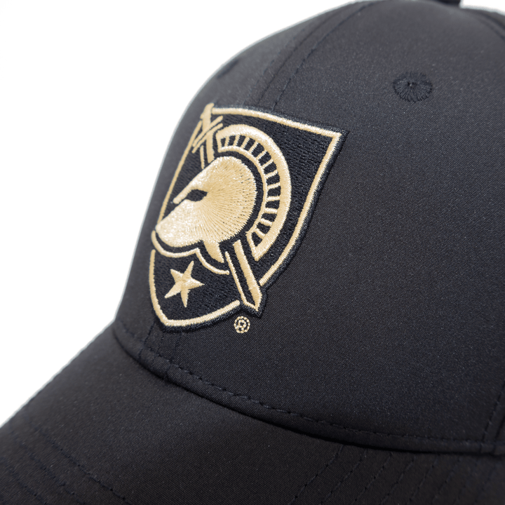 Close up view of the West Point embroidered shield logo on a performance black hat.
