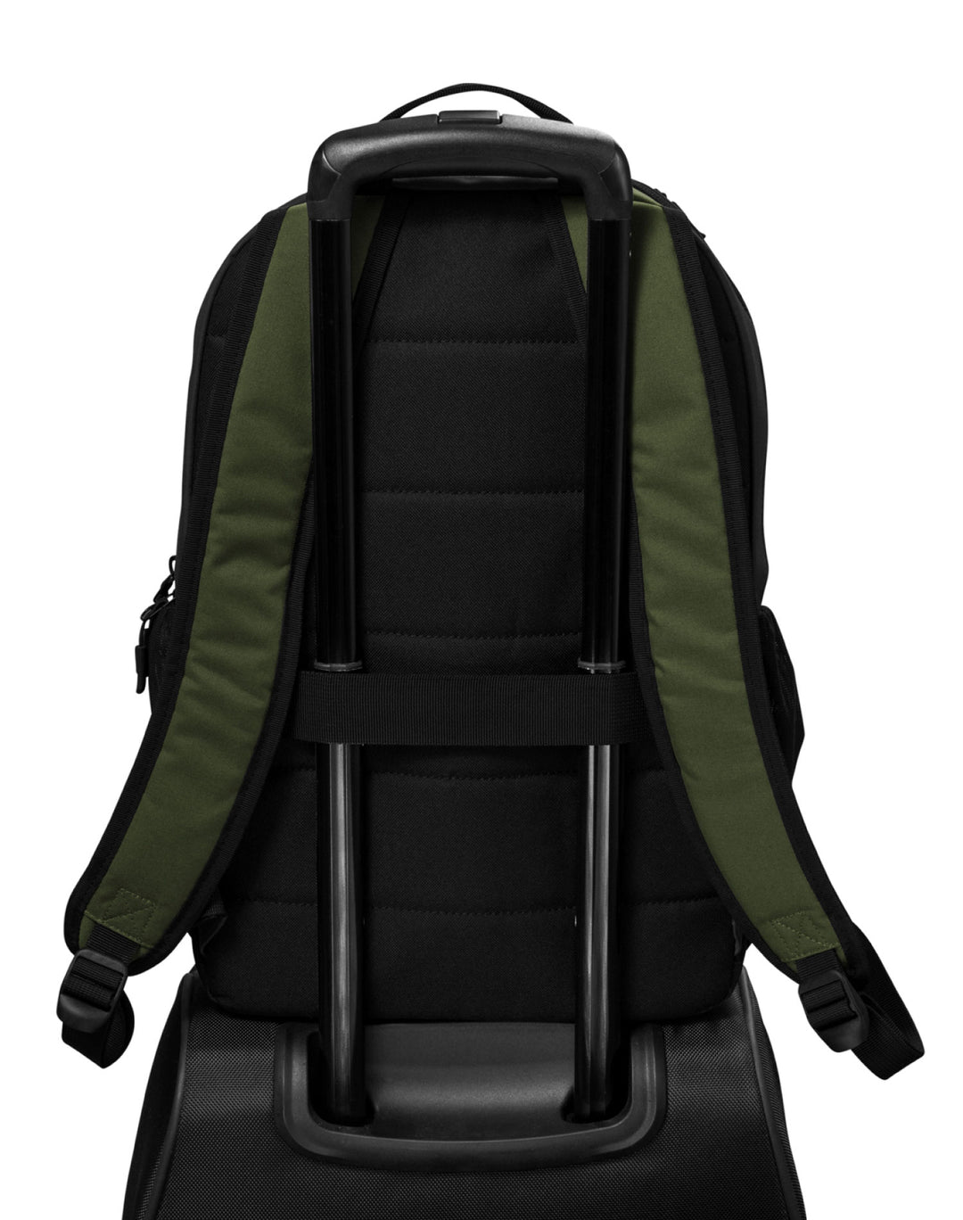 Green Michigan State backpack strapped to luggage.