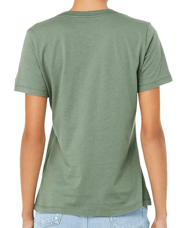 Backside view of woman wearing light green Michigan State shirt.