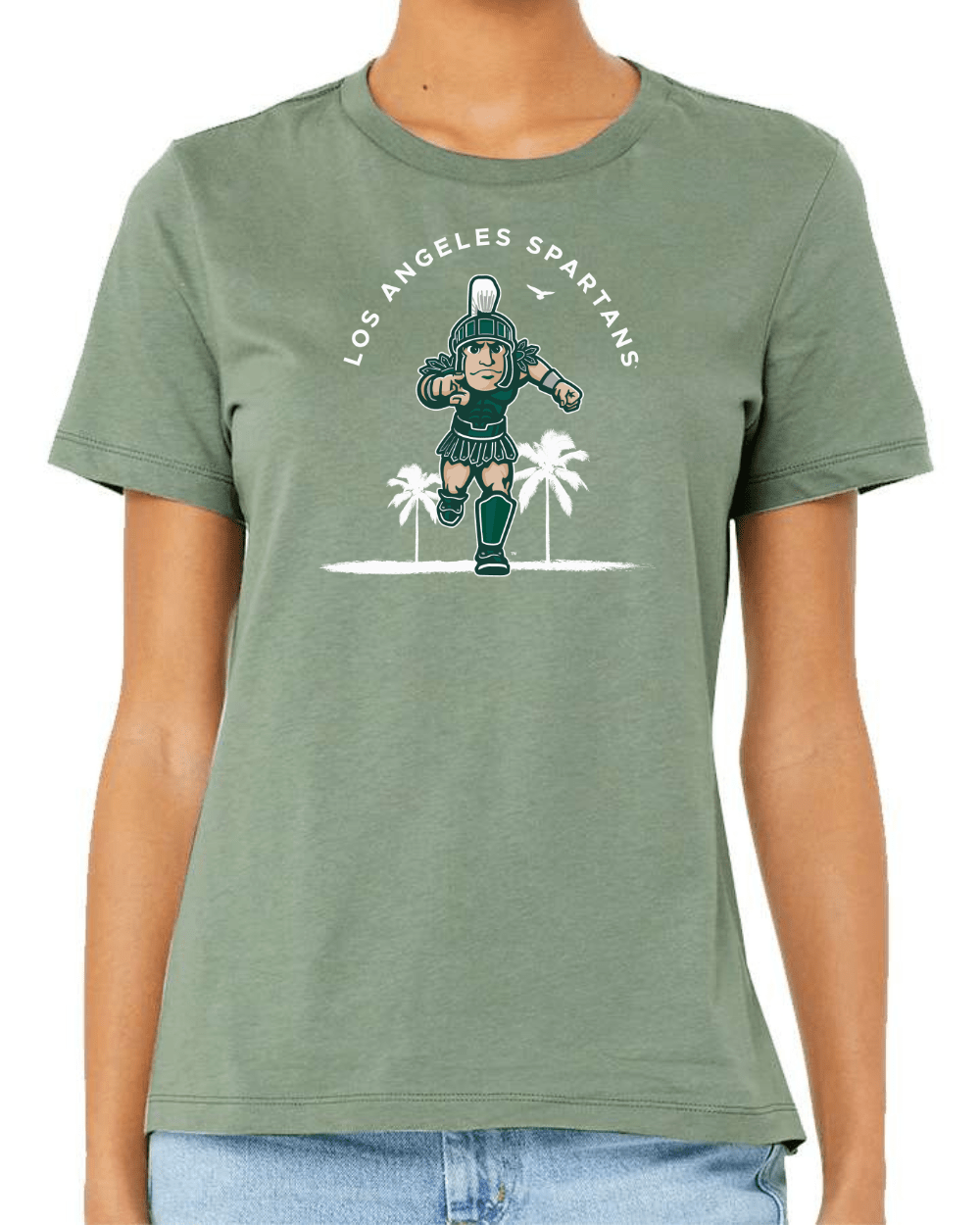 Woman wearing light green Michigan State shirt with Los Angeles Spartans design on chest.