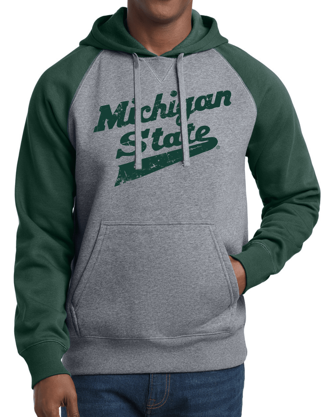 Frontside shot of male model wearing heavyweight Michigan State hoodie sweatshirt with MSU hockey font design printed across chest.