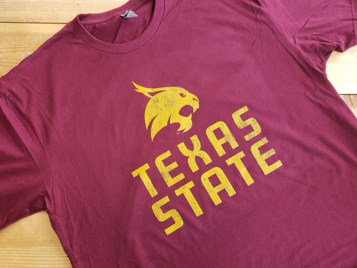 Texas State University Bobcats Stacked Logo T-shirt (Gold on Maroon)