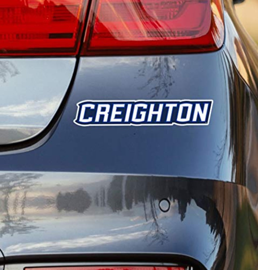 Blue and White "Creighton" Decal on Back of Car
