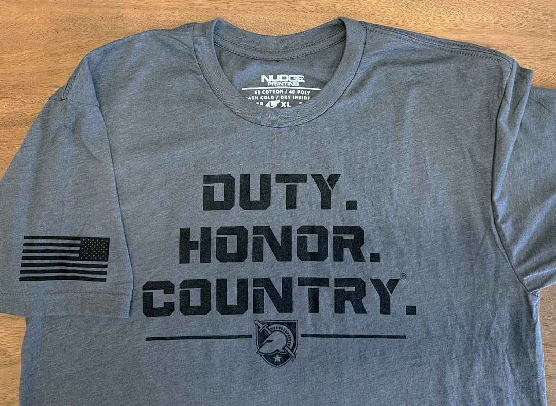 West Point Duty Honor Country in Black Text on Grey Shirt with Flag on Sleeve