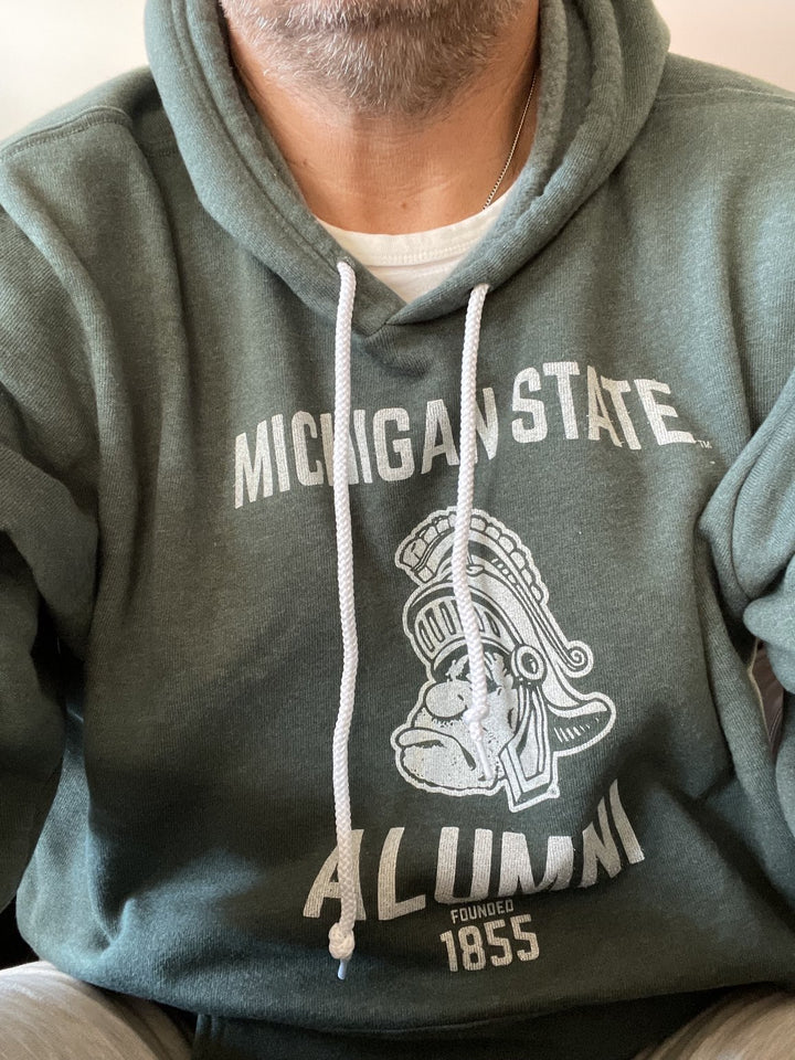Lifestyle photo of green Gruff Sparty Michigan State Sweatshirt